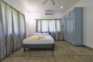 Cozy 1-Bed Apt in Whim Estate-near Scarborough tesisinde bir odada yatak veya yataklar