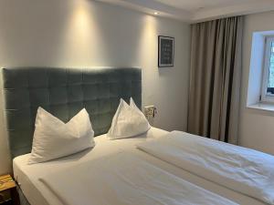 Postel nebo postele na pokoji v ubytování Hotel Pension Waldesruh