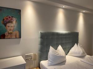 Postel nebo postele na pokoji v ubytování Hotel Pension Waldesruh