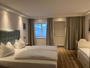 Postel nebo postele na pokoji v ubytování Hotel Pension Waldesruh