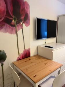 TV a/nebo společenská místnost v ubytování Hotel Pension Waldesruh