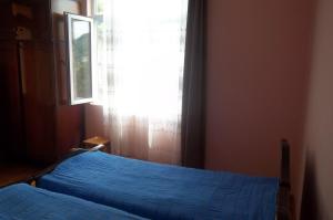 Postel nebo postele na pokoji v ubytování Temo's Guesthouse