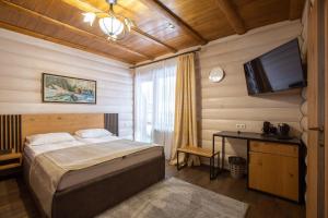 Letto o letti in una camera di Korona Hotel&SPA