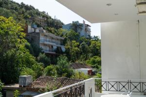 a view from the balcony of a house at Pagona Hotel in Loutra Edipsou