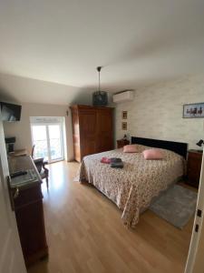 Postel nebo postele na pokoji v ubytování Maison d’izier