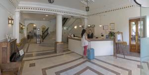 The lobby or reception area at Hotel Asturias
