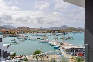 a view of a marina with boats in the water at Ouril Mindelo in Mindelo