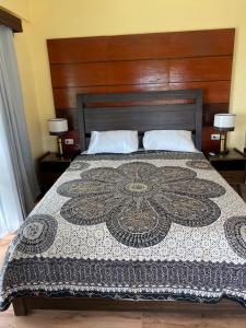 Postel nebo postele na pokoji v ubytování Private Beachfront Villa in Siargao
