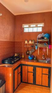 Kuchyň nebo kuchyňský kout v ubytování Villa Niscala 2