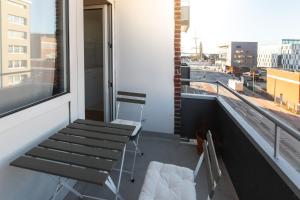 Balkón nebo terasa v ubytování Koje Neun I Apartment im Zentrum mit Hafenblick