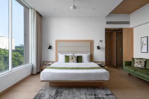 Voodi või voodid majutusasutuse Lemon Tree Hotel, Vadodara toas