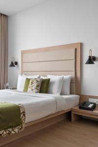 Voodi või voodid majutusasutuse Lemon Tree Hotel, Vadodara toas