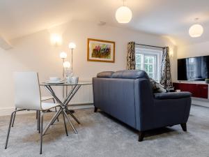 a living room with a couch and a table at 1 Bed in Chester 78587 in Chester