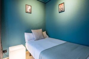 Ένα ή περισσότερα κρεβάτια σε δωμάτιο στο Ideal Hostel Madrid +31 φωτογραφίες