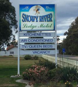 a large sign for a snow river lodge motel at Snowy River Lodge Motel in Orbost