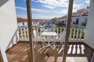 En balkon eller terrasse på HACIENDA 10B MENYBER