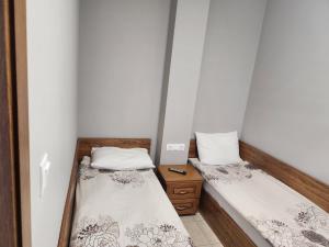 Cama o camas de una habitación en Royal Plaza Apartments Borovets