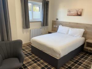 A bed or beds in a room at The Claremont Preston