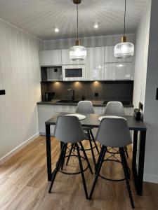 Kuchnia lub aneks kuchenny w obiekcie Apartamenty Piasek i Słońce