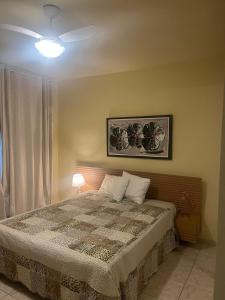 Ένα ή περισσότερα κρεβάτια σε δωμάτιο στο 20%OFF, Até 7Hóspedes, 5minutos da praia, Garagem,