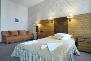 Кровать или кровати в номере Мини-отель Васильевский остров