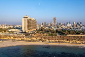 an aerial view of a beach and a city at Hilton Tel Aviv Hotel in Tel Aviv