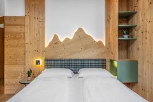 Postel nebo postele na pokoji v ubytování Hotel Franco