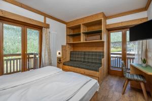 Postel nebo postele na pokoji v ubytování Hotel Franco