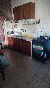 A kitchen or kitchenette at Charly's House