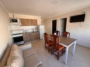 Køkken eller tekøkken på Complejo ALI121 Las Grutas