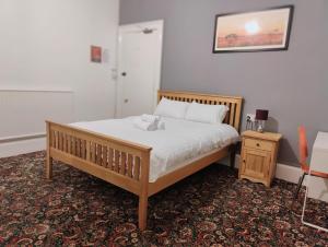 Postel nebo postele na pokoji v ubytování Aaran Central Guesthouse