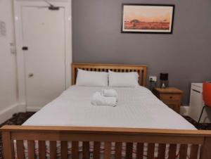 Postel nebo postele na pokoji v ubytování Aaran Central Guesthouse
