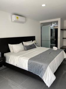 Voodi või voodid majutusasutuse Malokas Resort - Socorro - San Gil toas