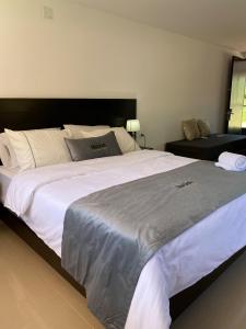 Voodi või voodid majutusasutuse Malokas Resort - Socorro - San Gil toas