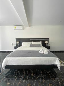 Voodi või voodid majutusasutuse Malokas Resort - Socorro - San Gil toas
