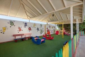 a play room with many different colored play equipment at Aydinbey Gold Dreams in Avsallar