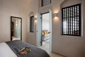 Letto o letti in una camera di Andromeda Villas & Spa Resort