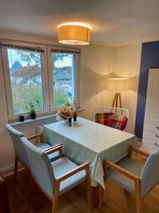 Posezení v ubytování Ruhige Ferienwohnung mit Sonnenterrasse und Garten