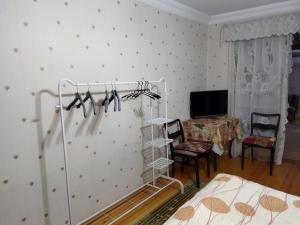 Rúm í herbergi á Бабушкин уют в РУСТАВИ