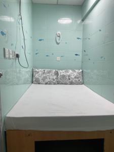 Voodi või voodid majutusasutuse Relaince lucky MIRADOR MANSION toas