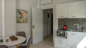 Una cocina o cocineta en Nest Port View Apartment