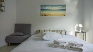 Posteľ alebo postele v izbe v ubytovaní Nest Port View Apartment