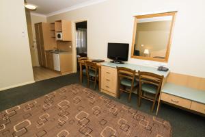 Kuchyň nebo kuchyňský kout v ubytování Green Gables Motel