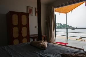 Letto o letti in una camera di COCO CABANA