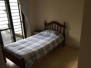 Postel nebo postele na pokoji v ubytování CASA DUPLEX CON PILETA/QUINCHO