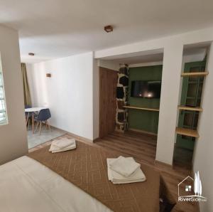 Voodi või voodid majutusasutuse River House Boutique Hotel toas