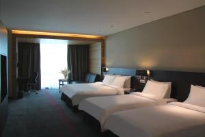 Postel nebo postele na pokoji v ubytování Grandis Hotels and Resorts