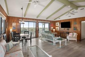 a living room with a couch and a table at Fripp Island 702 Tautog in Fripp Island