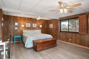 a bedroom with a bed and a ceiling fan at Fripp Island 702 Tautog in Fripp Island