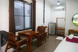Postel nebo postele na pokoji v ubytování Big Elk Steak House - HomeStay